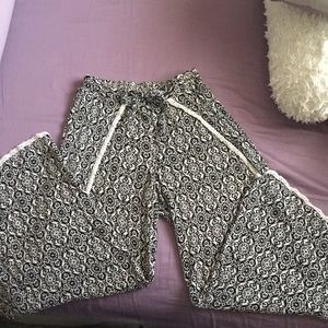 Opened legged pants, open from hip down